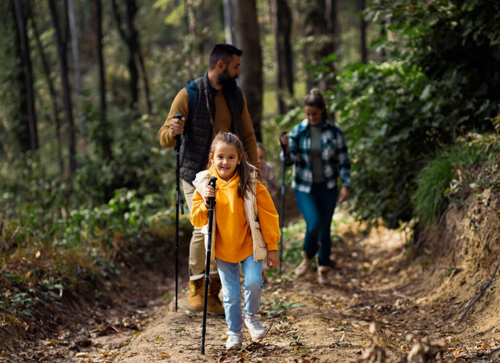 family of four hiking