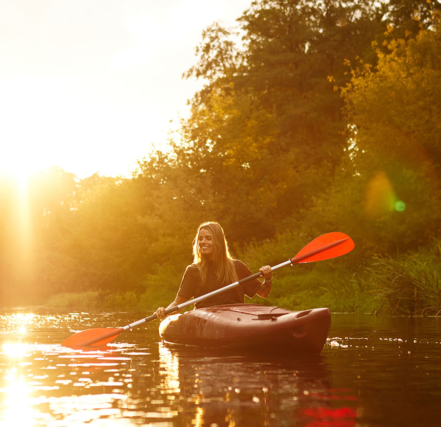 woman paddling a kayak